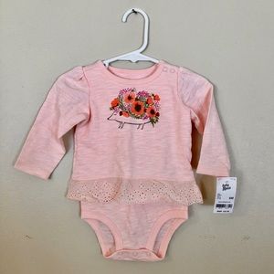 Pretty trimmed onesie